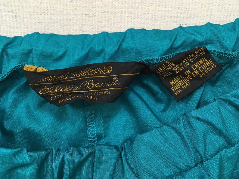 in teal nylon 1990/'s athletic pants by Eddie Bauer