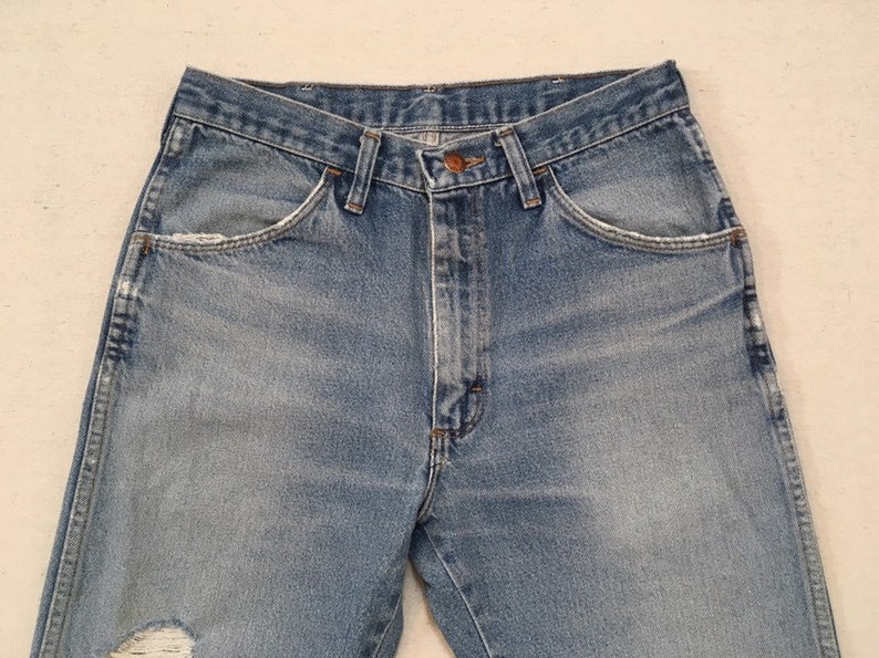 1980's Worn and Holy Jeans by Rustler - Etsy