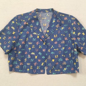 1960's, handmade, short sleeve, no close, bolero jacket, in periwinkle with adorable print