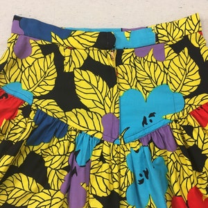 1990's, puffy shoulder, cropped jacket and dropped yoke, mini-skirt set, in colorful, African, floral print image 9