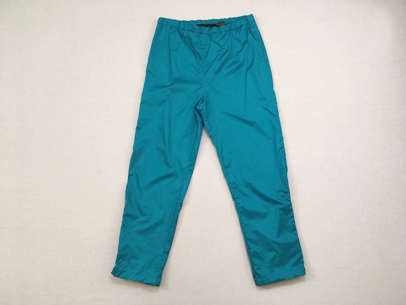 in teal nylon 1990/'s athletic pants by Eddie Bauer