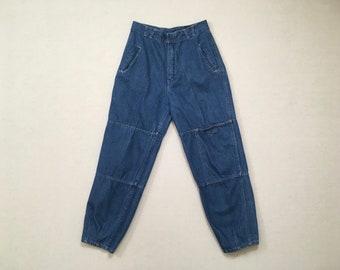 1980's, high waist, slightly tapered,, cropped leg, baggy, bare back jeans