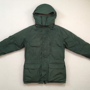 1990&#39;s, down filled, hooded, drawstring waist parka in Forest Green and navy, by Eddie Bauer