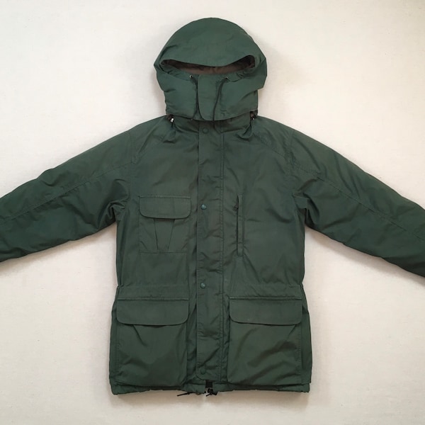 1990's, down filled, hooded, drawstring waist parka in Forest Green and navy, by Eddie Bauer