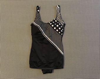1970's, low cut, one piece, bathing suit, in black, with white polka-dots