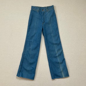 1970, jeans bootcut di Male