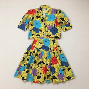 1990's, puffy shoulder, cropped jacket and dropped yoke, mini-skirt set, in colorful, African, floral print image 1