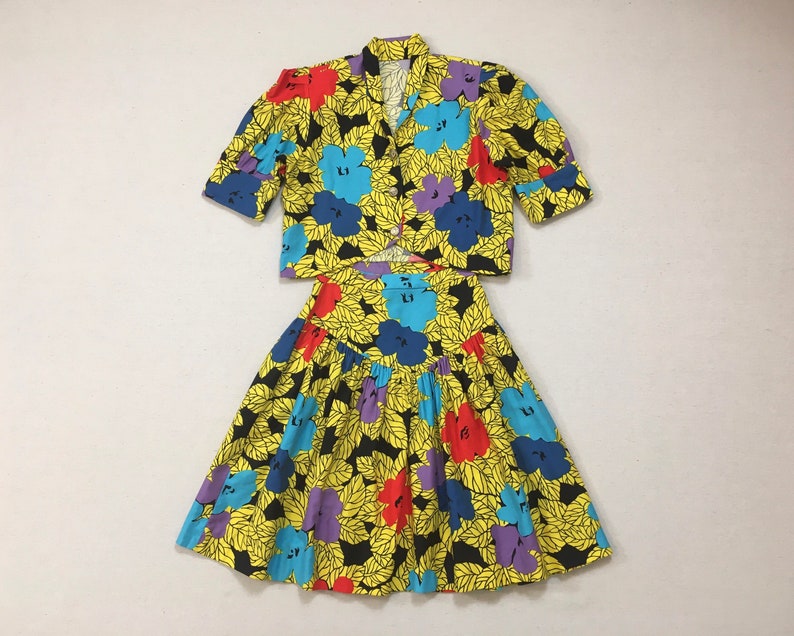 1990's, puffy shoulder, cropped jacket and dropped yoke, mini-skirt set, in colorful, African, floral print image 1