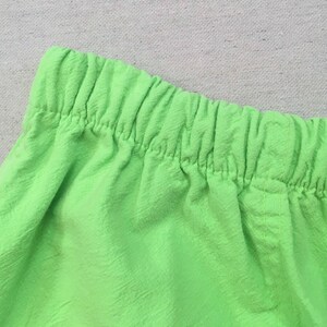 1990's, cotton, Cancun shorts, in neon green with neon pink, orange and blue image 3