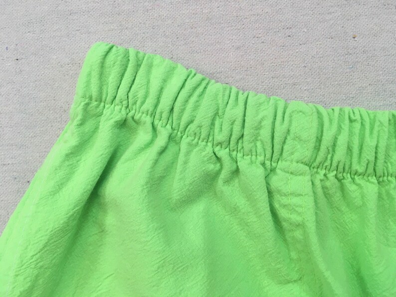 1990's, cotton, Cancun shorts, in neon green with neon pink, orange and blue image 3