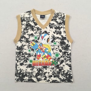 2000&#39;s, cotton, sleeveless &quot;MEGAMAN X5&quot; top, in black and white with red, blue, yellow and green, with beige trim