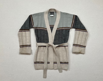 1970's, belted, bell sleeve, pocket cardigan in beige and gray with stripes in browns and blue