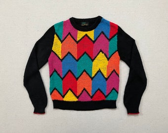 1980's, sweater in black with nubby, colorful, zig zag design