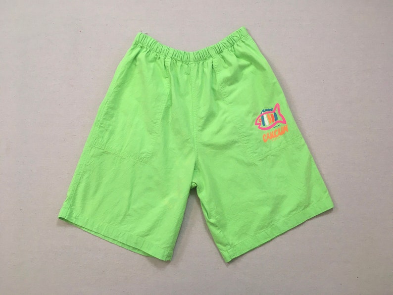 1990's, cotton, Cancun shorts, in neon green with neon pink, orange and blue image 1