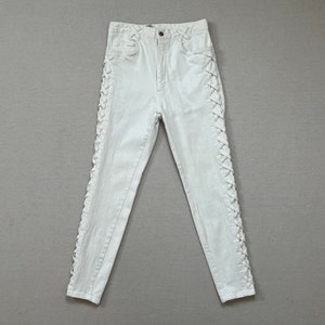 1980&#39;s, high waist, stretch jeans with side weaving, in white