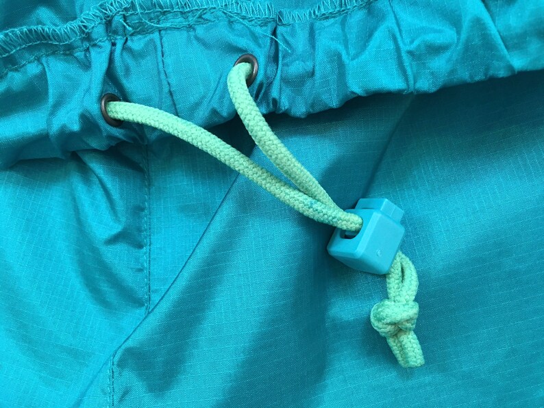 in teal nylon 1990/'s athletic pants by Eddie Bauer