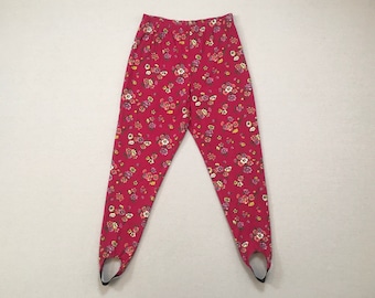 1980's, jersey knit, stirrup pants, in fuchsia with pink, orange, yellow, white and green, floral print