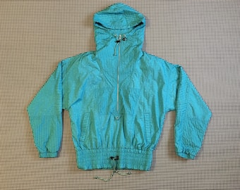 1980's, hooded, pullover, nylon jacket, in turquoise stripes and stars print, by Nils, Women's size Medium