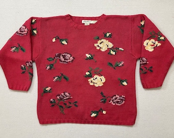 1990's, cotton sweater in rose with rose design in yellows, greens and purples by Eddie Bauer