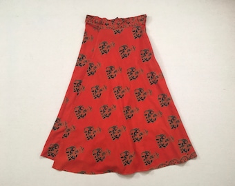 1970's, wrap skirt, in brick red, with navy and khaki, elephat print