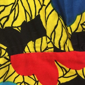 1990's, puffy shoulder, cropped jacket and dropped yoke, mini-skirt set, in colorful, African, floral print image 10