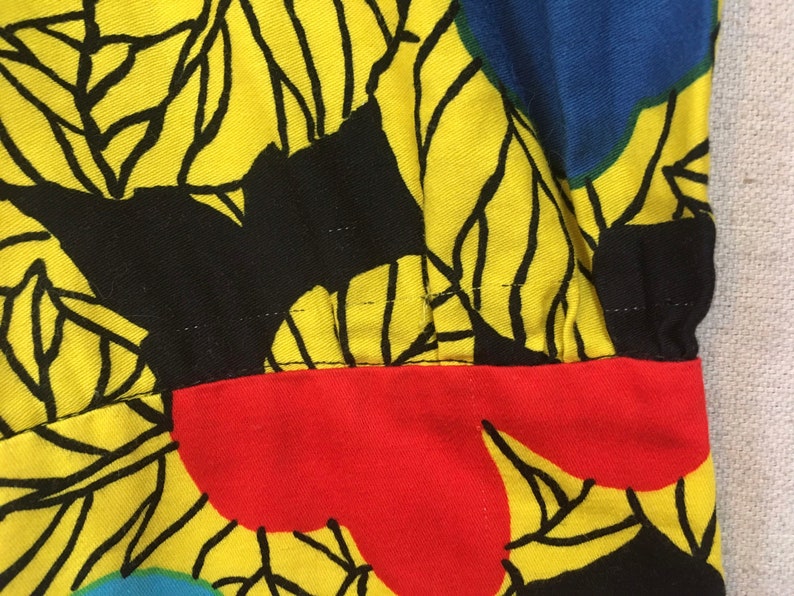 1990's, puffy shoulder, cropped jacket and dropped yoke, mini-skirt set, in colorful, African, floral print image 10