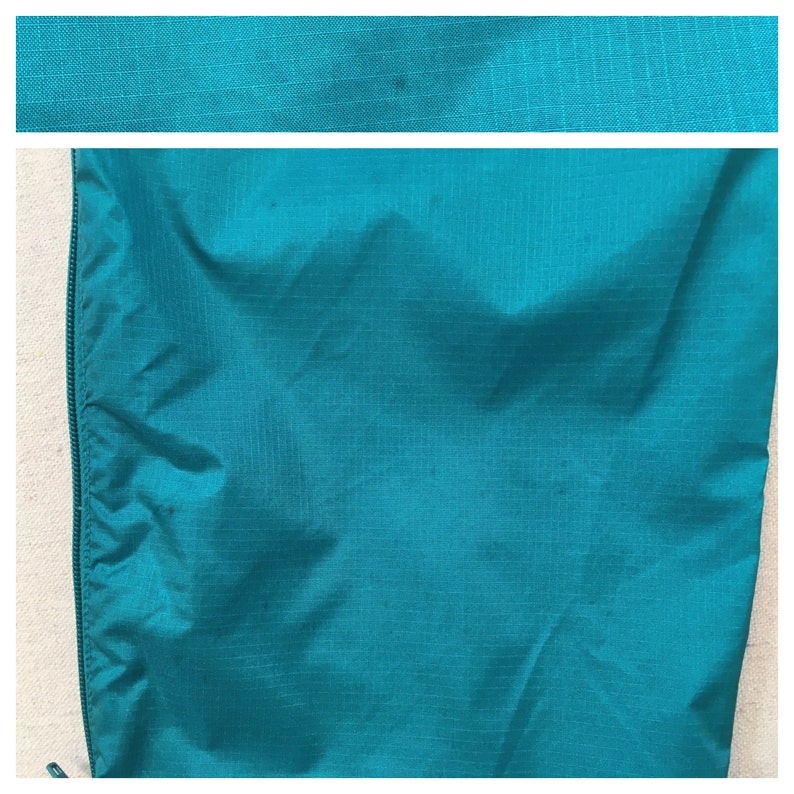 in teal nylon 1990/'s athletic pants by Eddie Bauer
