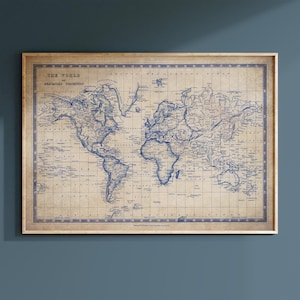 May include: A rectangular wall map titled The World on Mercator's Projection, featuring dark blue ink lines on a light tan, aged-paper background. The map displays continents, oceans, and grid lines within a decorative border in a wooden frame.