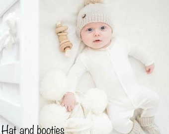 knit baby pom pom hat and booties with buttons, gender neutral