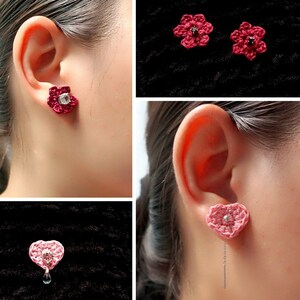 May include: A collage of handmade crochet earring jackets in various styles. The earrings include flower and heart designs in shades of pink and red, some with crystal accents. The text "Earring Jackets" is displayed at the bottom.