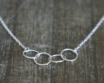 Entwined Circle Necklace / Four Tiny Silver Linked Infinity Rings on a Sterling Silver Chain • Interlocking Eternity Circles Dainty Jewelry