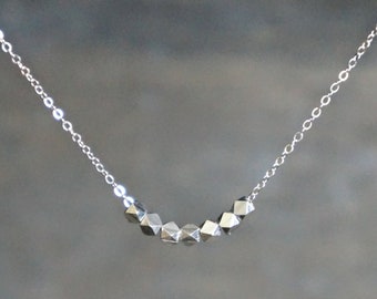 Seven Silver Nuggets Necklace / 7 Tiny Silver Chunks on a Sterling Silver Chain • Family of Seven • 7 Decades • Necklace for Mom, Grandma