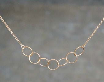 Entwined Circle Necklace / Seven Tiny Gold Linked Infinity Rings on a 14k Gold Filled Chain • Interlocking Eternity Circles Dainty Jewelry