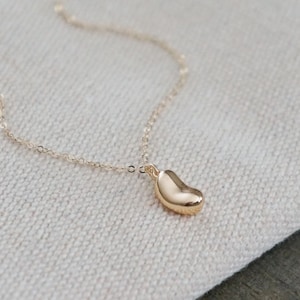 Gold Bean Necklace // Tiny Bean Pendant on a 14k Gold Filled Chain • Dainty Little Bean Necklace • Golden Kidney Bean Jewelry