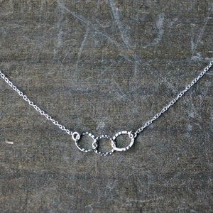 Three Entwined Circle Necklace / Tiny Silver Linked Hammered Infinity Rings on a Sterling Silver Chain .. tiny interlocking eternity circles