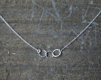Three Entwined Circle Necklace / Tiny Silver Linked Hammered Infinity Rings on a Sterling Silver Chain .. tiny interlocking eternity circles