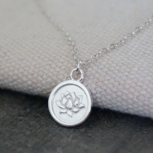 Silver Lotus Disc Necklace // Symbolic Flower Pendant on a Sterling Silver Chain • Blooming Lotus Disk Necklace • Dainty Silver Jewelry