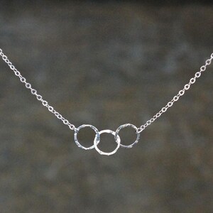 Three Entwined Circle Necklace / Tiny Silver Linked Hammered Infinity Rings on a Sterling Silver Chain .. tiny interlocking eternity circles