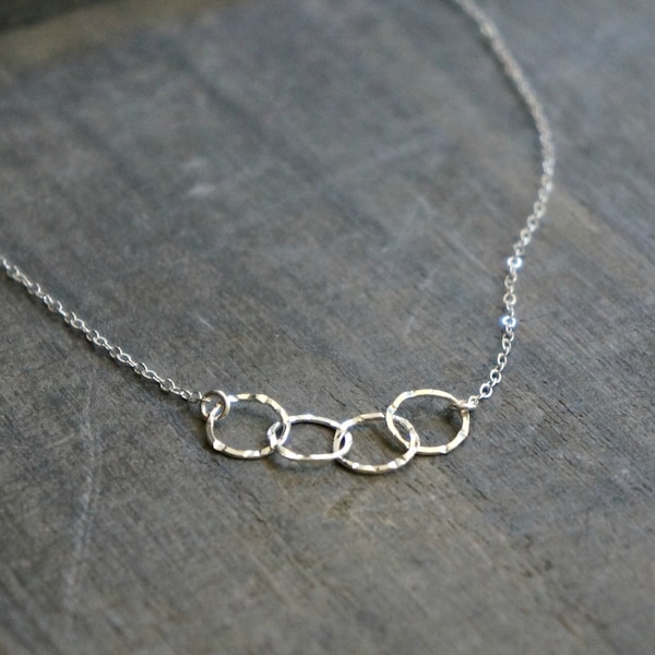 Four Entwined Circles Necklace / Tiny Silver Linked Hammered Infinity Rings on a Sterling Silver Chain .. tiny interlocking eternity circles