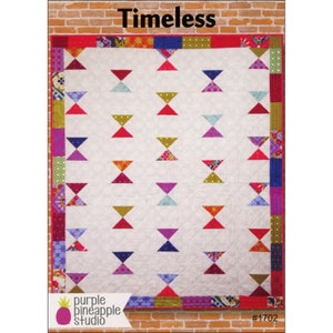 May include: A quilt pattern called "Timeless" by Purple Pineapple Studio. The quilt features a white background with a repeating pattern of colorful hourglass shapes. The border is made up of colorful fabric scraps.