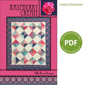 May include: A quilt pattern named "Raspberry Cream" with a floral border. The quilt design features alternating squares of white and patterned triangles in shades of pink, blue, and grey. The words "Instant Download" and "PDF" are also visible.