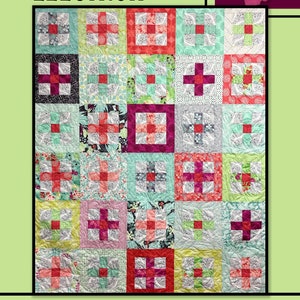 May include: A quilt pattern called "Electron" by Villa Rosa Designs. The quilt is made up of a grid of colorful squares with different patterns. The squares are in shades of red, pink, green, and white.