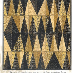 May include: A quilting pattern called "Wildcard" featuring a geometric design of black and gold triangles. The pattern is for a quilt, but extra blocks can be used for a matching floor pillow or table runner.