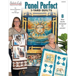 May include: Two women holding quilts, with the text "Panel Perfect 3-Yard Quilts" and "8 New Quilts designed for panels!". The quilts feature images of wolves, elephants, and a sun face. The Fabric Cafe logo is in the upper left corner.