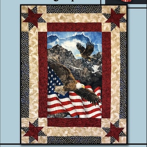 May include: A quilt pattern featuring two bald eagles flying over a mountain range with an American flag in the foreground. The quilt pattern is surrounded by a red, white, and blue star border. The title "Daring Spirit" and the text "Villa Rosa Designs" are visible on the image.