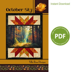 May include: A digital download PDF sewing pattern for a quilt titled "October Sky". The quilt features a forest scene with a path leading through the trees. The pattern is by Villa Rosa Designs.