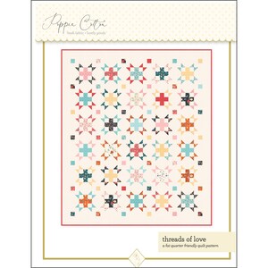 May include: A quilt pattern design featuring a colorful patchwork quilt with a variety of floral and geometric patterns. The quilt is made up of squares and is arranged in a grid pattern. The quilt is called "Threads of Love" and is described as a "fat quarter friendly quilt pattern".