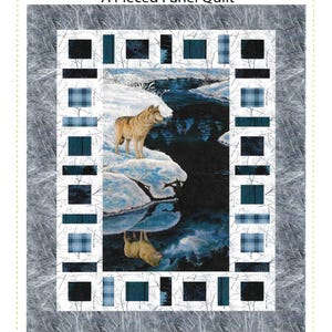 May include: A panel quilt featuring a wolf standing on a snowy bank, with its reflection in the water. The quilt is framed with a border of blue and black squares and the text "Two by Four" and "Quilting Renditions".