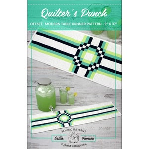 May include: Quilter's Punch table runner sewing pattern, featuring a modern design with black, green, and white stripes. The pattern is for a table runner that measures 9 inches by 37 inches.
