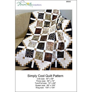 May include: A quilt pattern titled Simply Cool Quilt Pattern #444 by Pleasant Valley Creations. The quilt features a grid of square blocks in black, white, and tan with geometric and circular prints, available in sizes from 44" x 59" to 104" x 104".